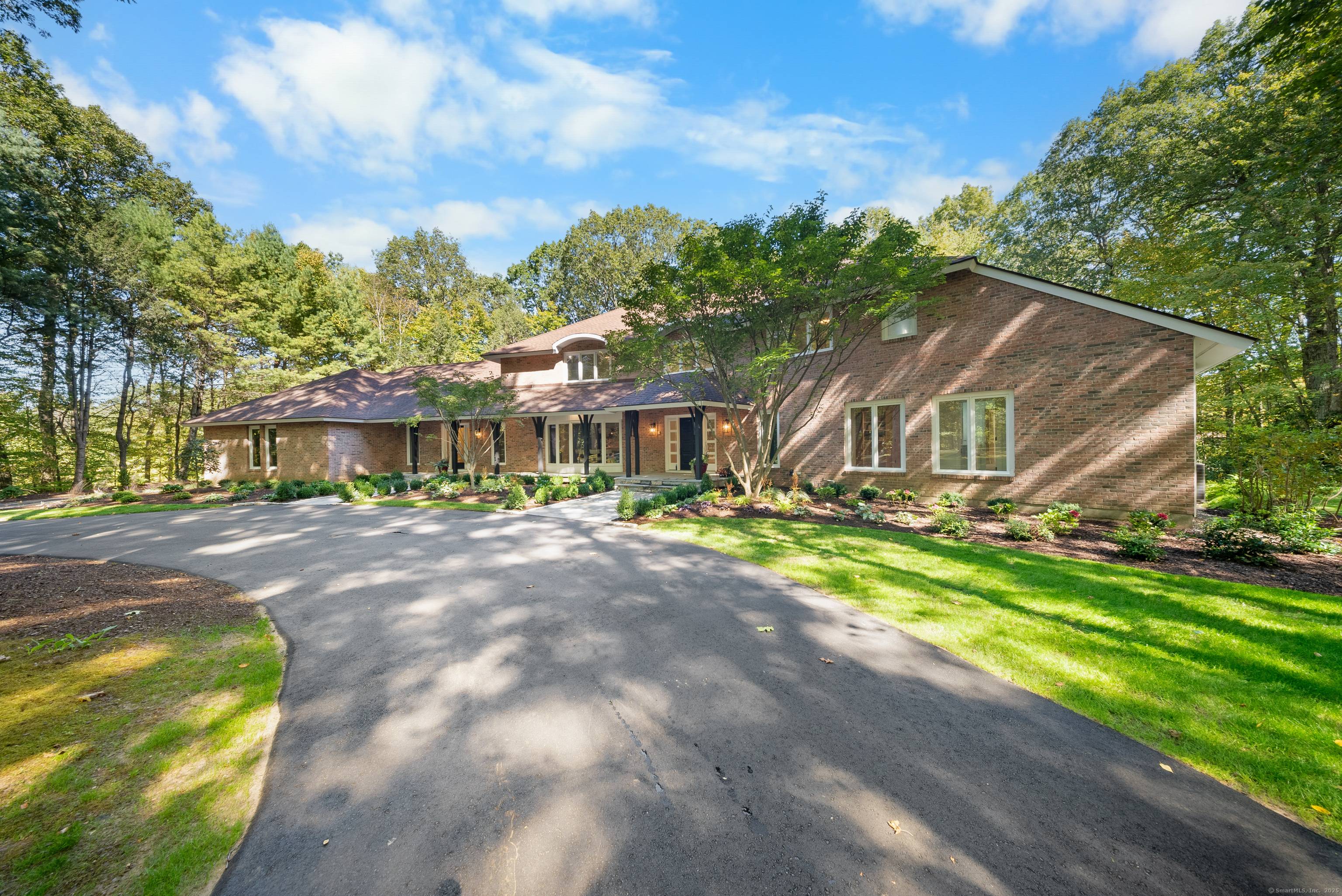 Set back from the street in the sought after Avonridge neighborhood, this 6000 sq ft luxury estate has undergone a modern renovation.