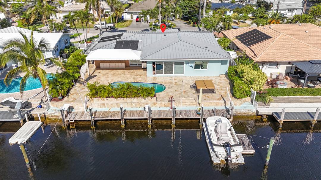 Live the waterfront dream in Pompano Beach's coveted Harbor Village !