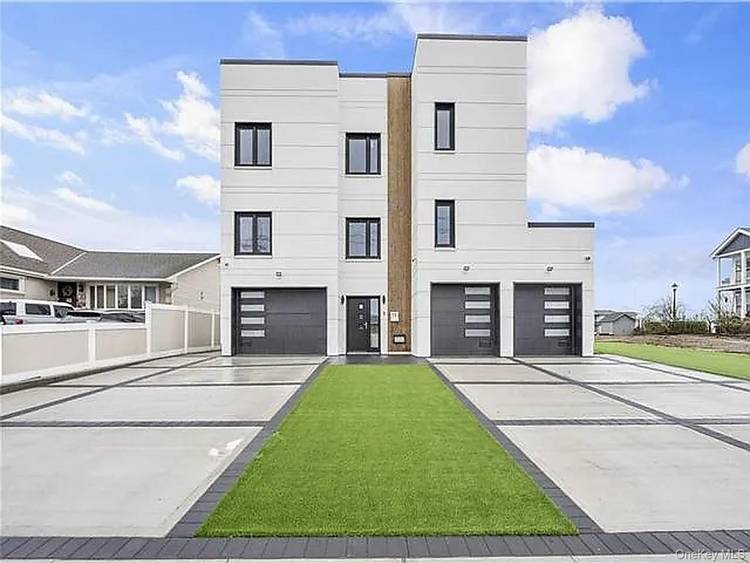 Welcome to 72 Washington Avenue in Harbor Isles, an extraordinary 3, 952 square foot waterfront townhome offering sophisticated modern living, exceptional amenities and an incredible indoor outdoor lifestyle.