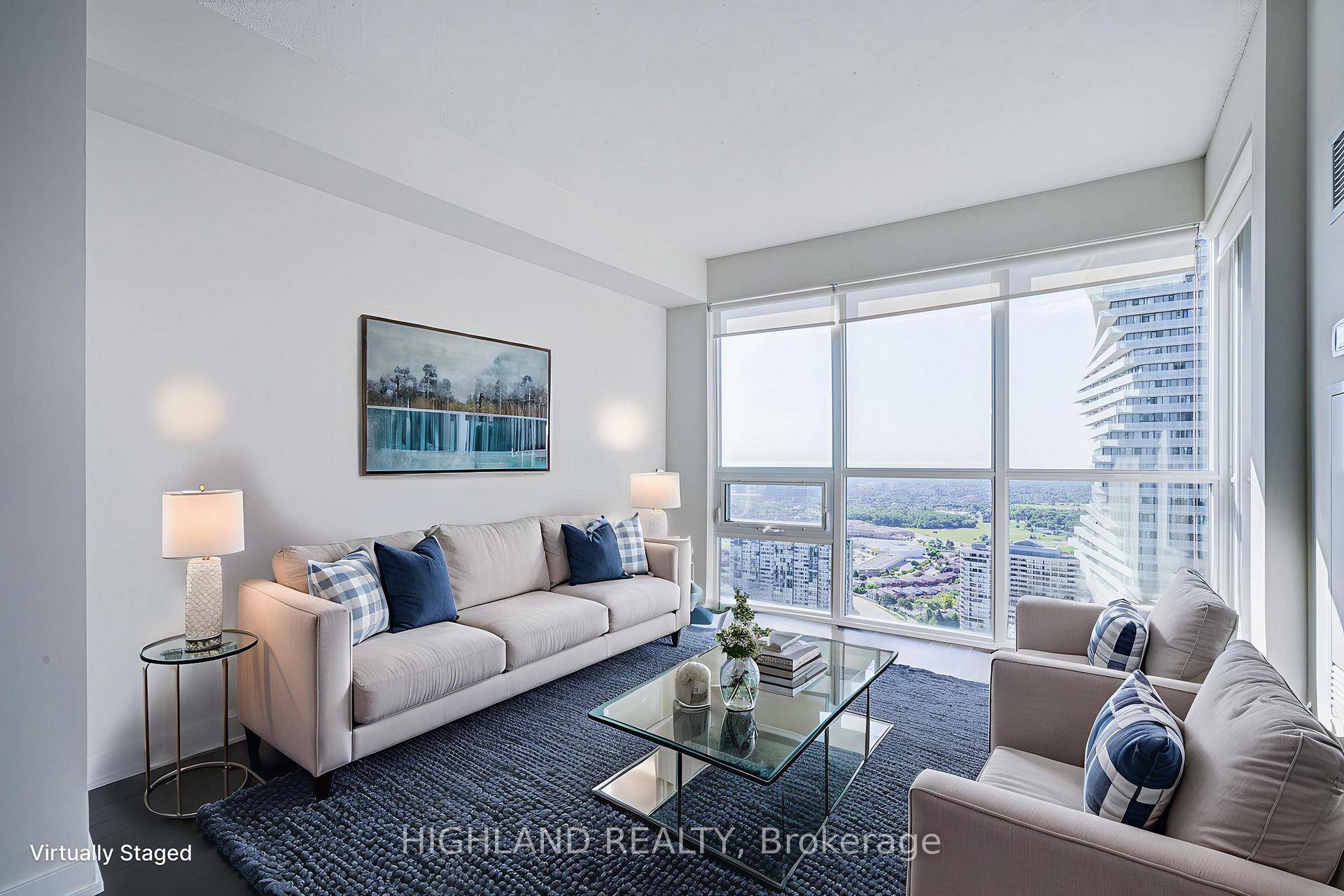 Immaculate High Floor 1 Den with South Exposure and Stunning Lake Views in the Heart of Square One !