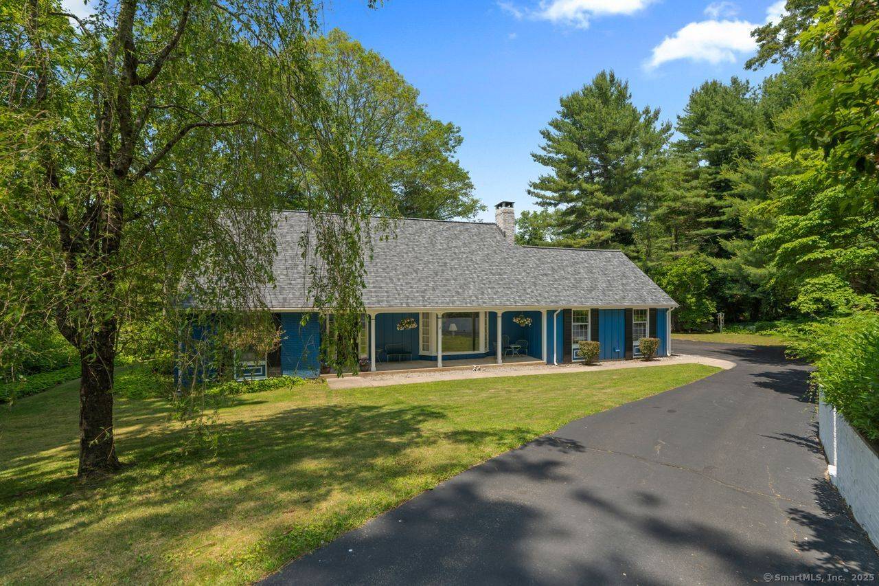 Situated in one of Old Lyme's most desirable neighborhoods, this beautifully maintained 4 bedroom, 2.