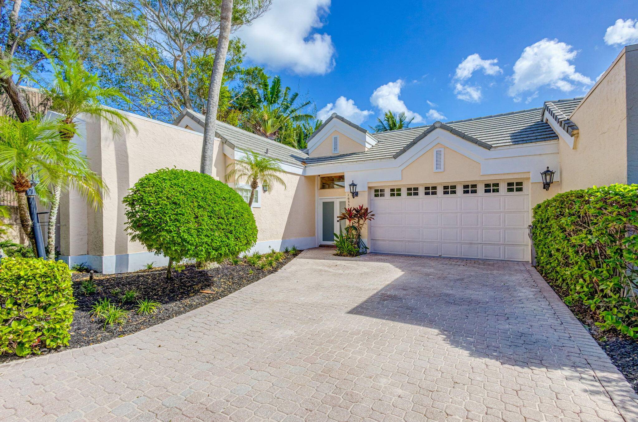 This absolutely stunning WATERFRONT courtyard home sits directly on the Intracoastal !