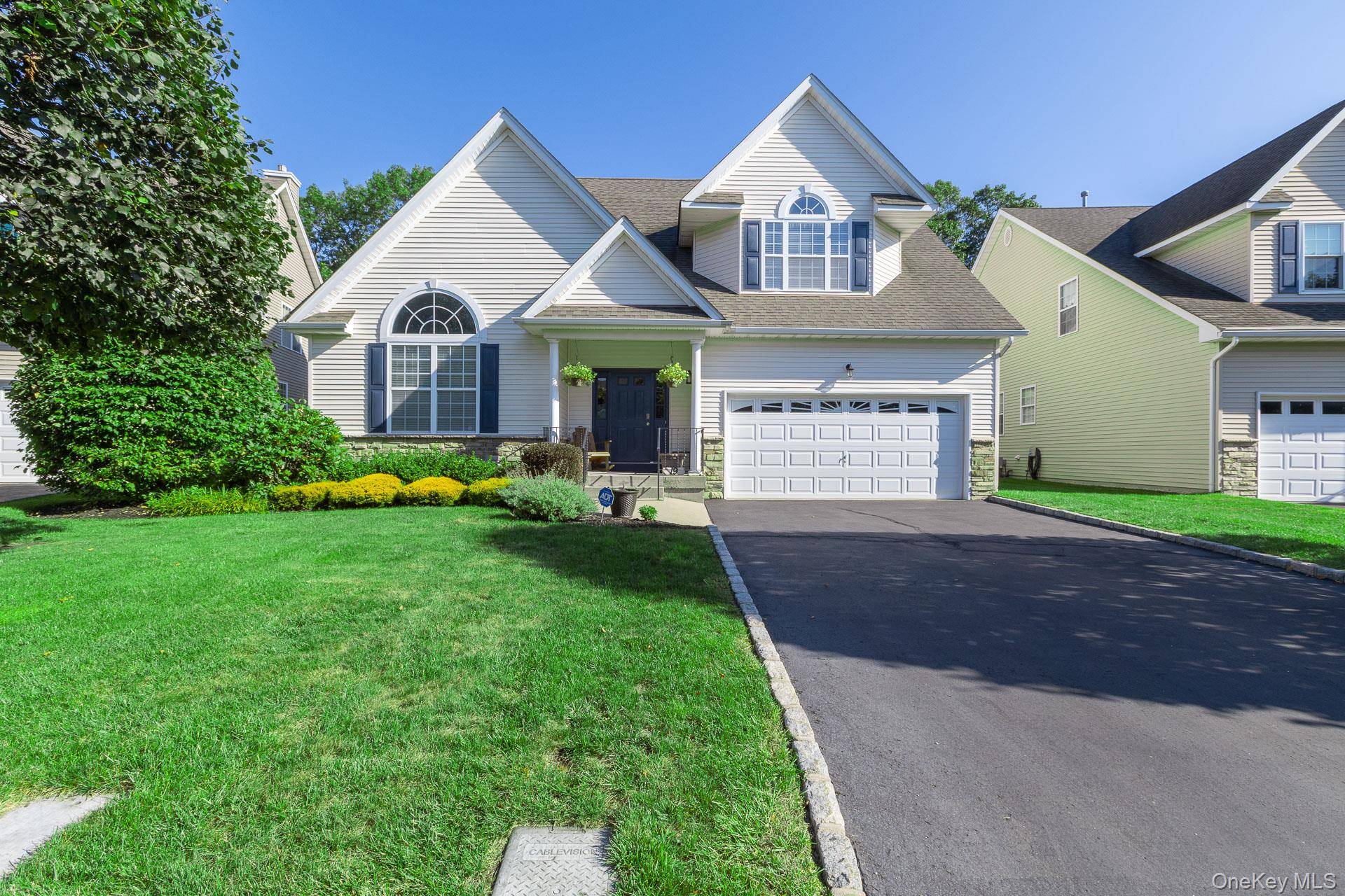 Welcome to this stunning detached townhome in the highly sought after Wading River Woods HOA community.