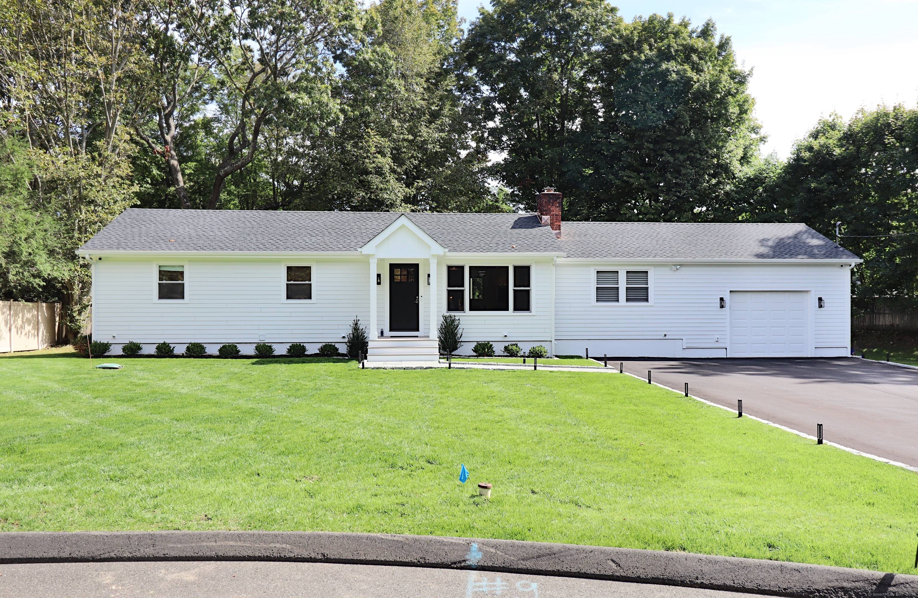 Welcome to a refined Elegance Nestled at the end of a cul de sac in Norwalk, the Village of Rowayton.