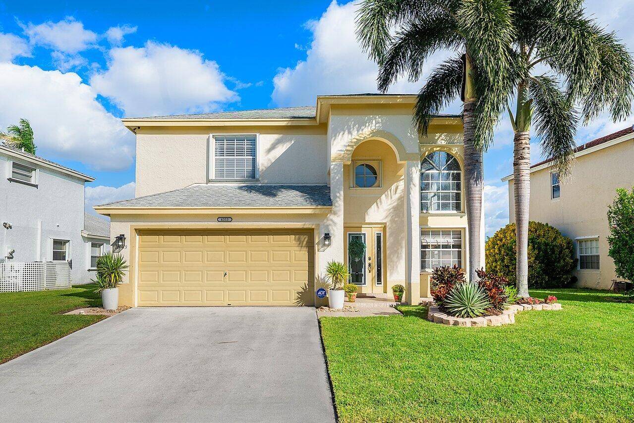 Welcome to your dream home in Bay Estates at Rainbow Lakes !