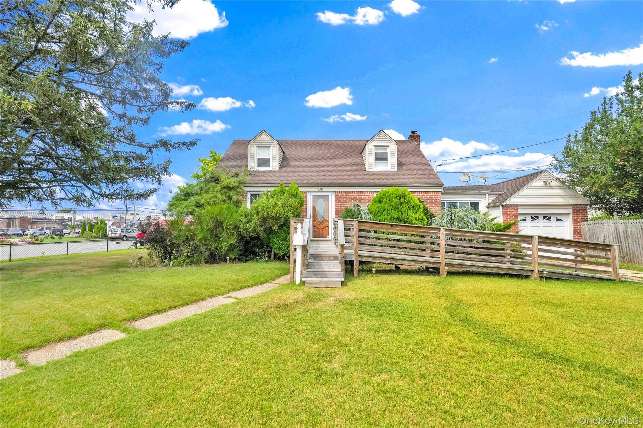 Welcome to 2347 Roosevelt Avenue in East Meadow, a spacious corner home offering comfort, functionality, and convenience.