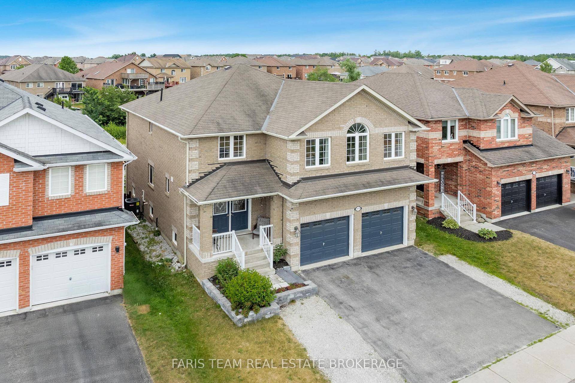 Top 5 Reasons You Will Love This Home 1 Spacious open concept home showcasing hardwood and ceramic tile flooring throughout the main level with convenient laundry and garage access 2 ...