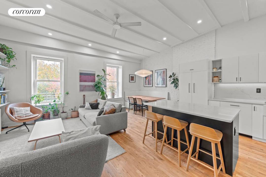 Travel back in history and relax amongst the trees in this spectacular top floor apartment at 328 Clinton Avenue.