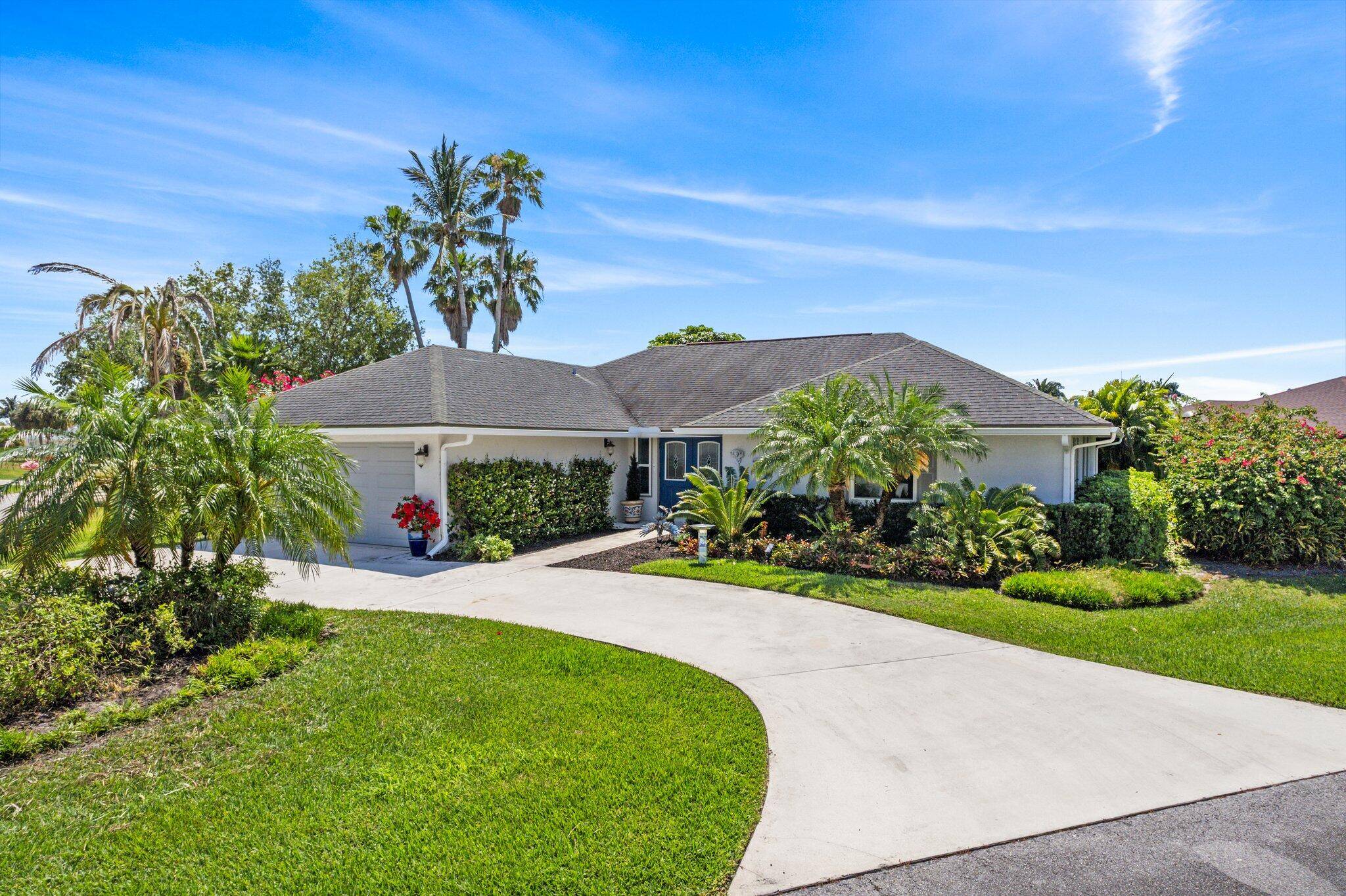 Welcome to your very own waterfront paradise in the gated community of Queens Cove on Hutchinson Island.