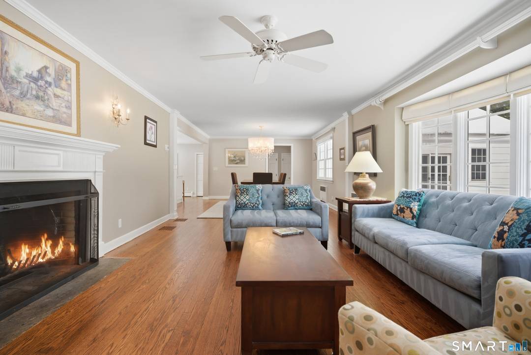 This beautifully designed residence seamlessly blends timeless charm with modern sophistication, showcasing sun drenched interiors, inviting fireplaces, and refined architectural details throughout.