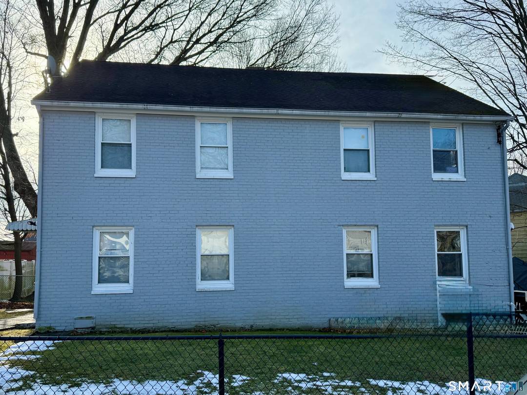 This solid brick duplex offers an excellent chance for homeowners or investors seeking long term value.