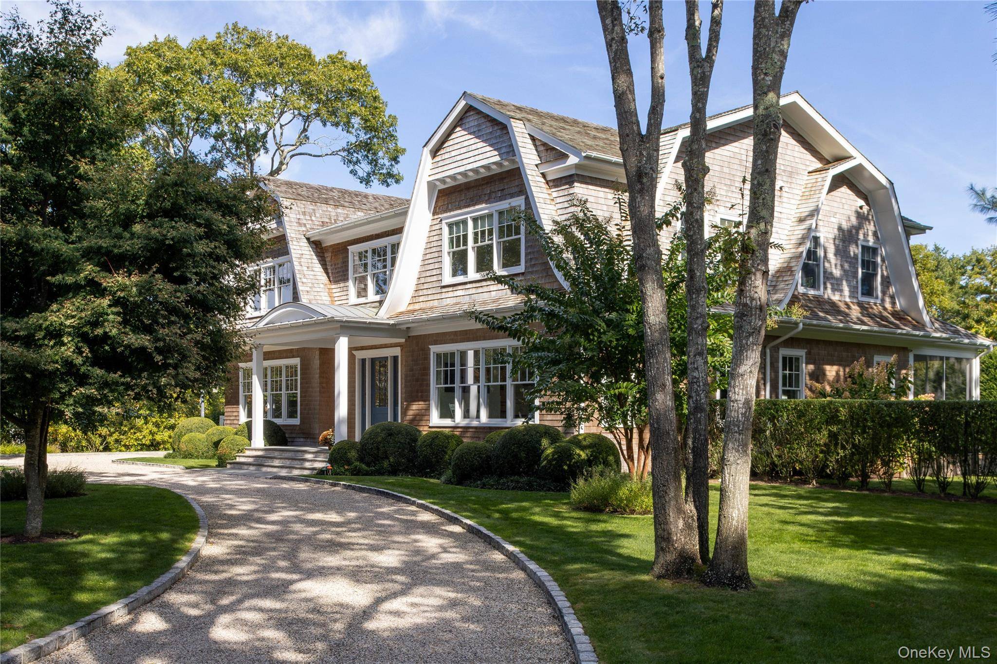 In the heart of Westhampton Beach Village, discover an exquisite shingle style Hamptons estate, blending timeless architecture and design with modern sophistication.