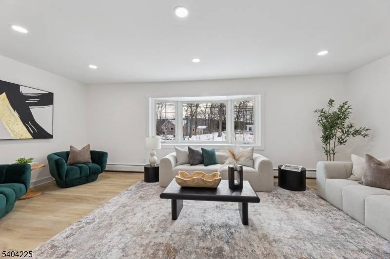 Welcome to this beautifully renovated bi level home offering comfort, style, and scenic lake views.