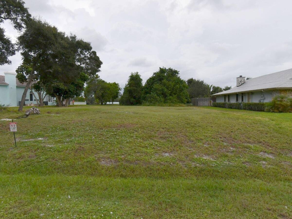 Embrace waterfront living with this rare.