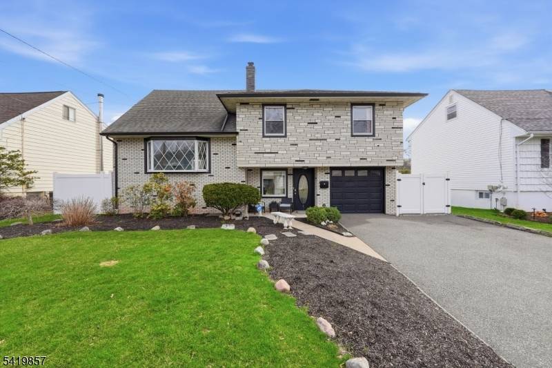 Welcome to this beautifully renovated residence showcasing a modern open concept design and exceptional indoor outdoor living.