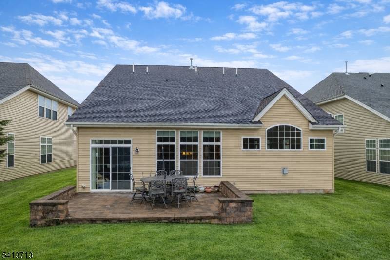 PREMIUM LOCATION ! This pristine Casante three bedroom model with loft and sunroom backs to a private wooded setting, offering peaceful views and exceptional privacy.