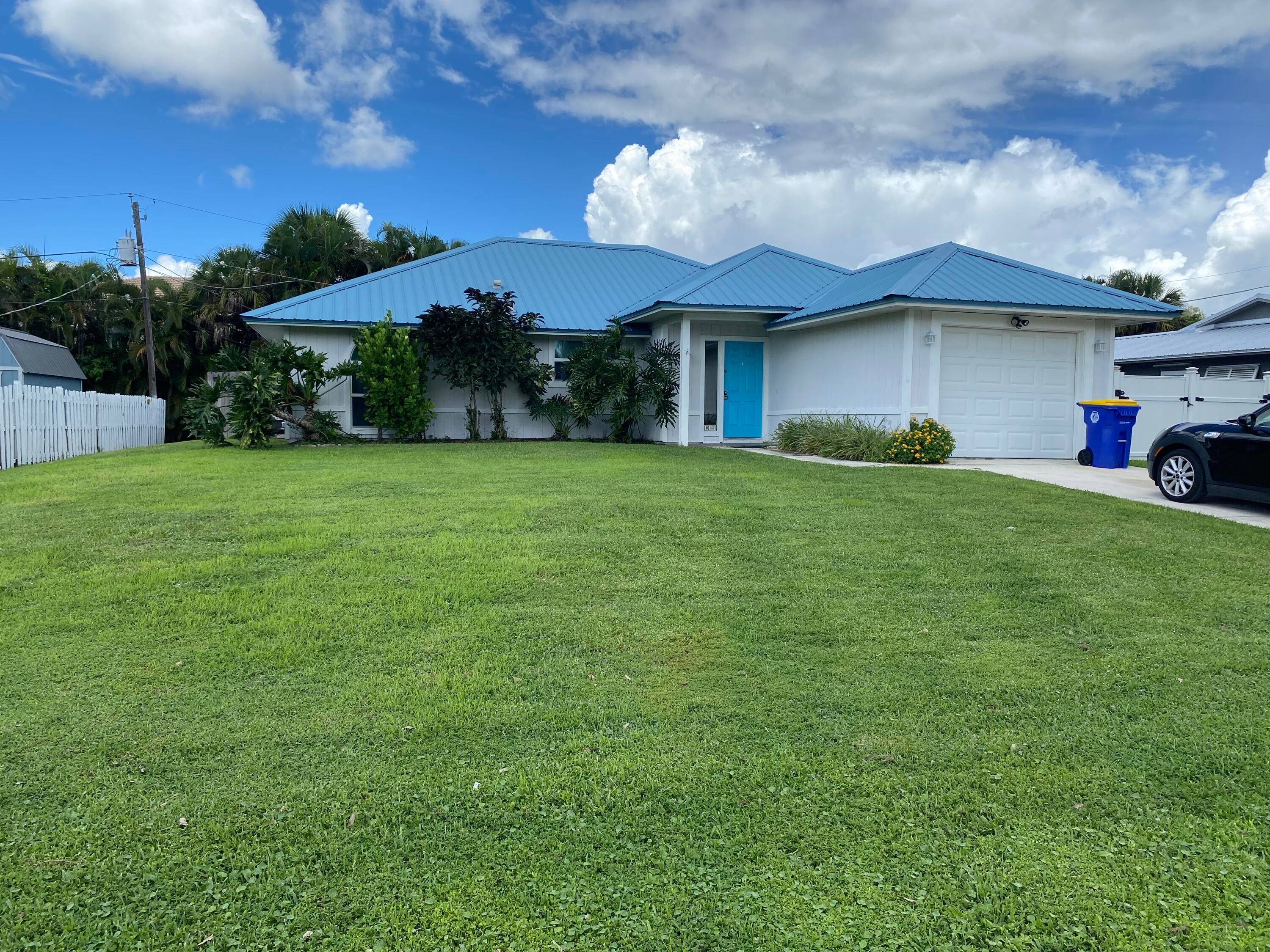 3 bedroom 2 bathroom remodeled home in Palm City on a quiet street.