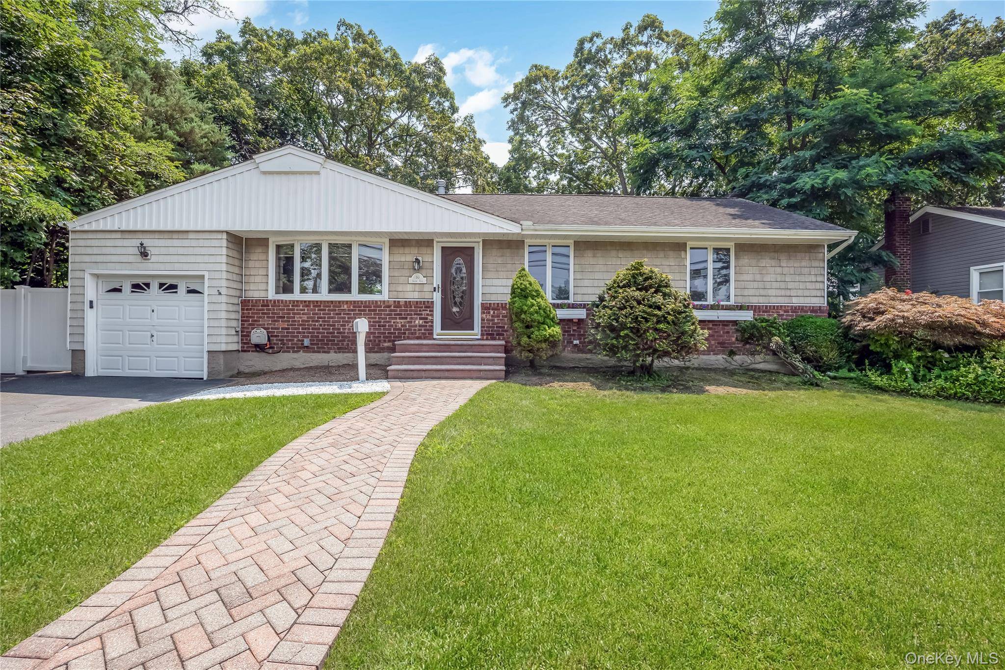 Beautiful remodeled wideline Ranch situated on quiet mid block features great curb appeal with brick and vinyl sided exterior, vinyl soffits, leaders and gutters, double blacktop driveway with brick borders, ...