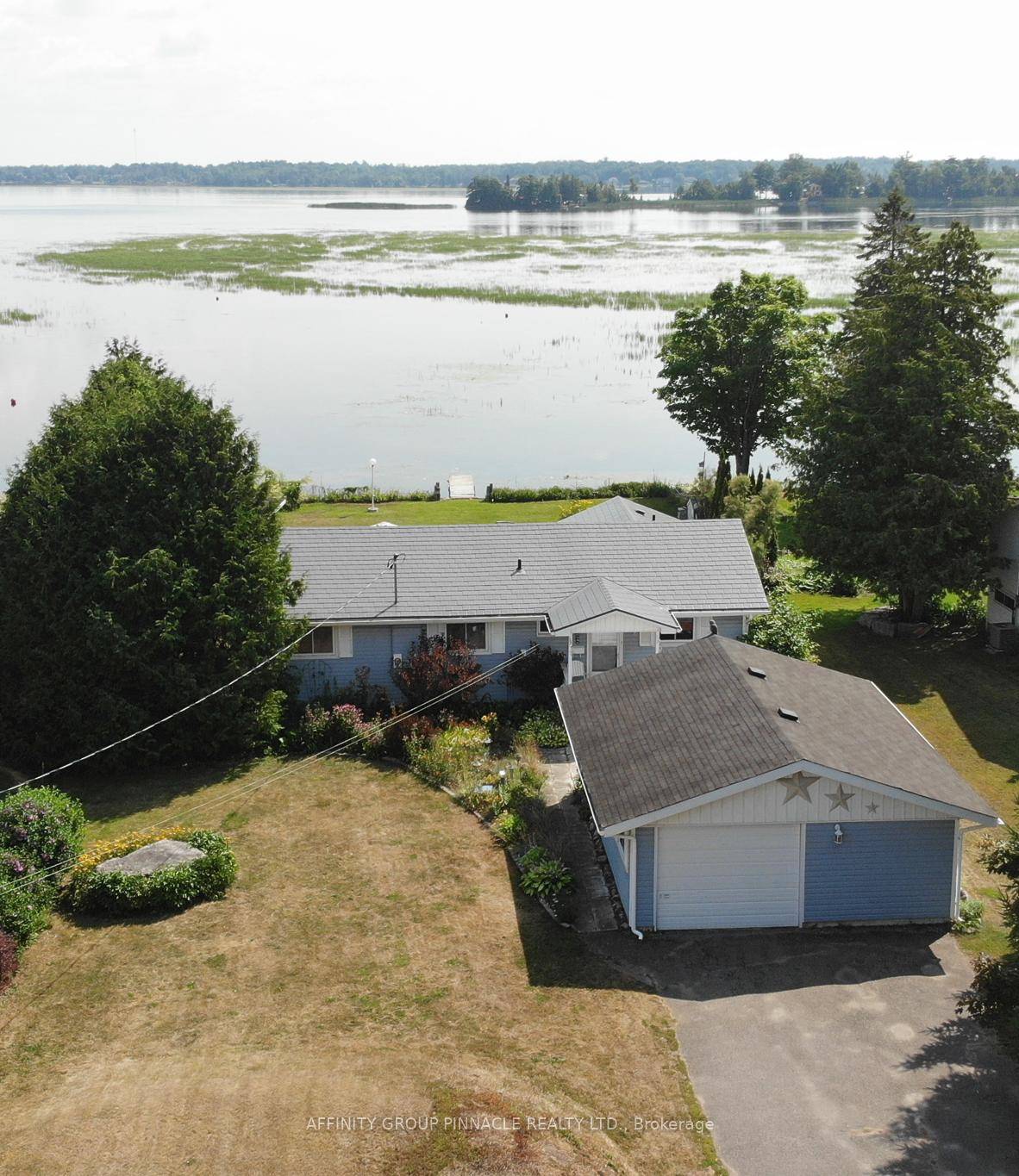 Welcome to your dream lakeside escape on beautiful Pigeon Lake, part of the Trent Severn Waterway, offering endless boating adventures and breathtaking sunrises.