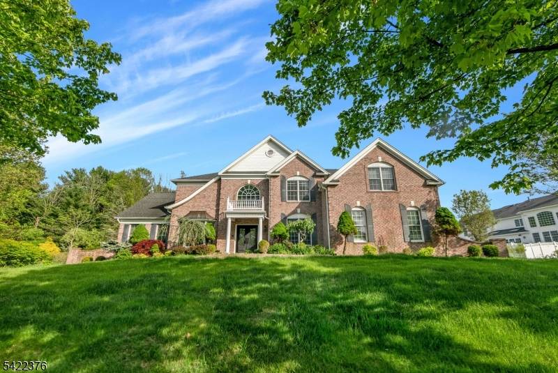 Crafted with care, nestled in a picturesque cul de sac, this stunning luxurious colonial home offers timeless elegance with a modern twist.