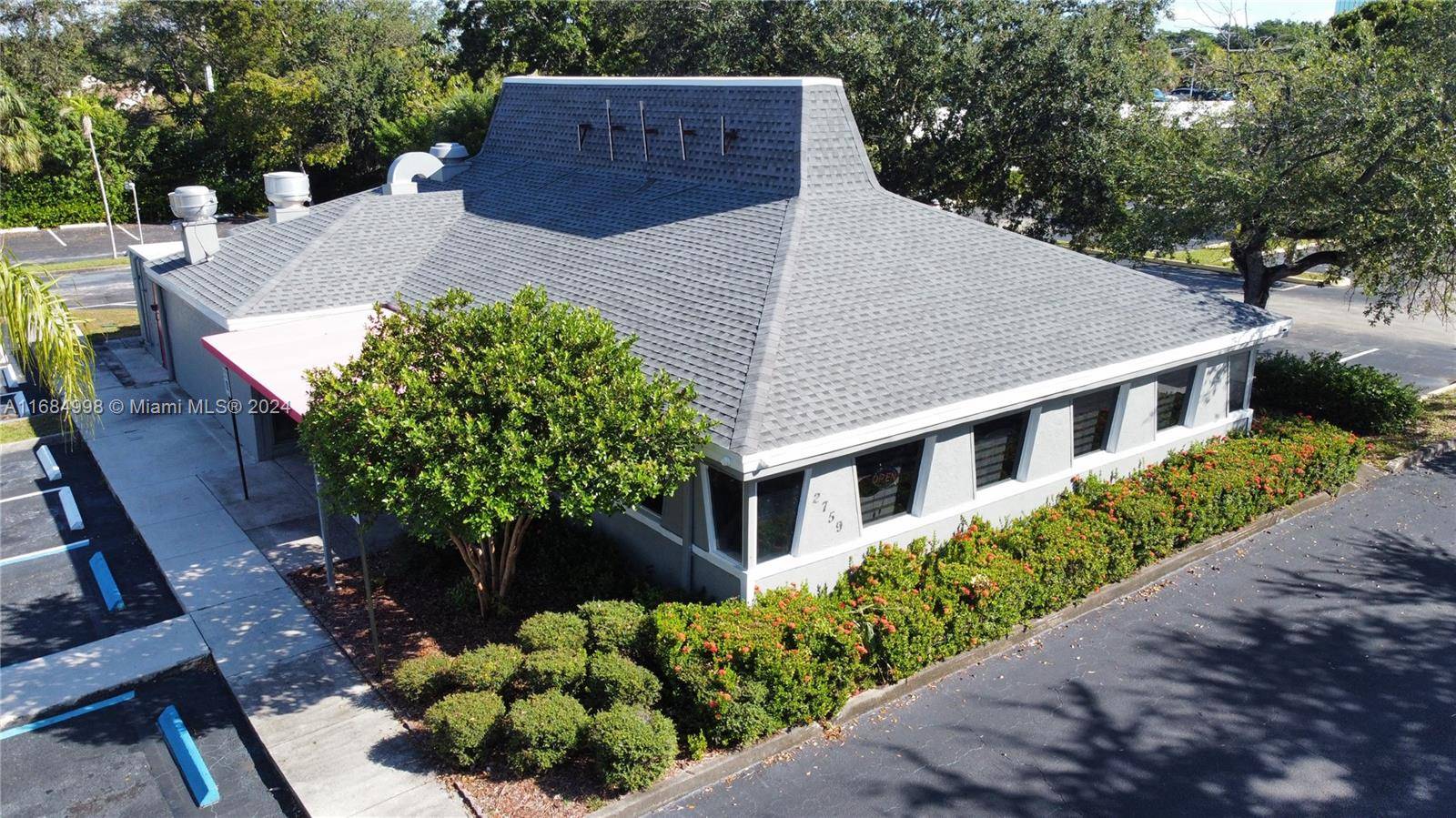 The property is a retail building zoned B1, located within a proposed redevelopment area encompassing approximately 28, 000 square feet of mixed use space.