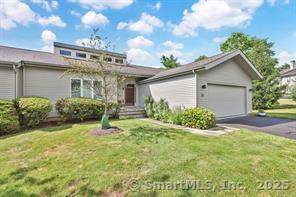Experience effortless style, sprawling ranch style living, and truly low maintenance ease in this expansive condo in Avon's coveted Hunter's Run.