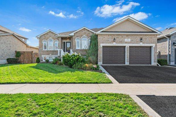 Luxurious, high end all brick bungalow nestled at the end of a quiet cul de sac is the epitome of elegance and modernity.