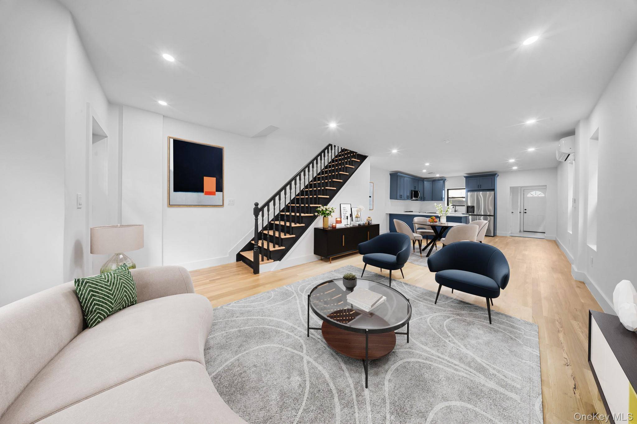 371 Grant Avenue is a meticulously renovated 100 brick single family townhouse nestled on a beautiful tree lined street of the Cypress Hills City Line border line.