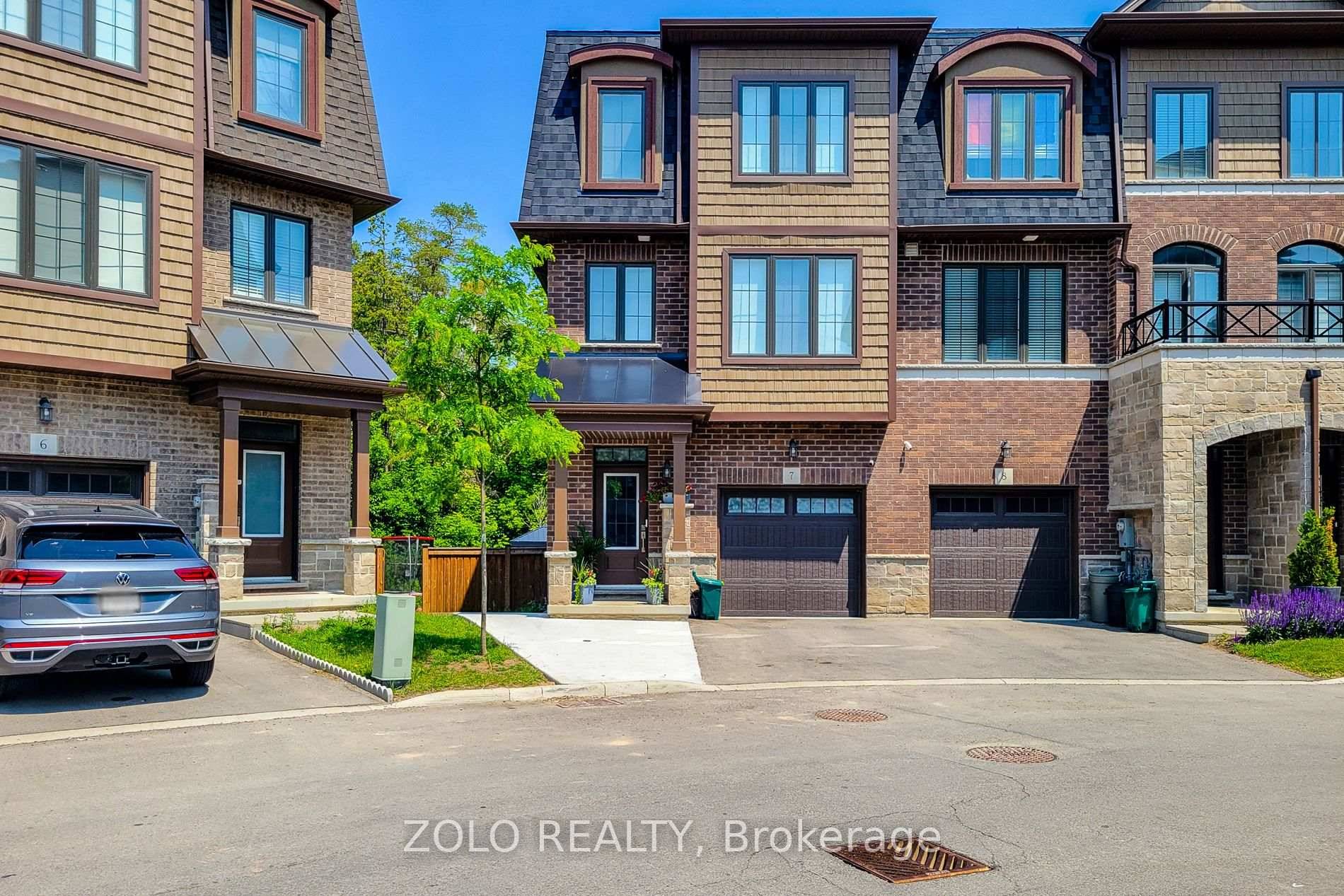 Stunning, generously sized, and thoughtfully upgraded EXECUTIVE END UNIT TOWNHOME offering 1, 900 SQ FT of elegant, functional living space on a PRIME PREMIUM LOT.
