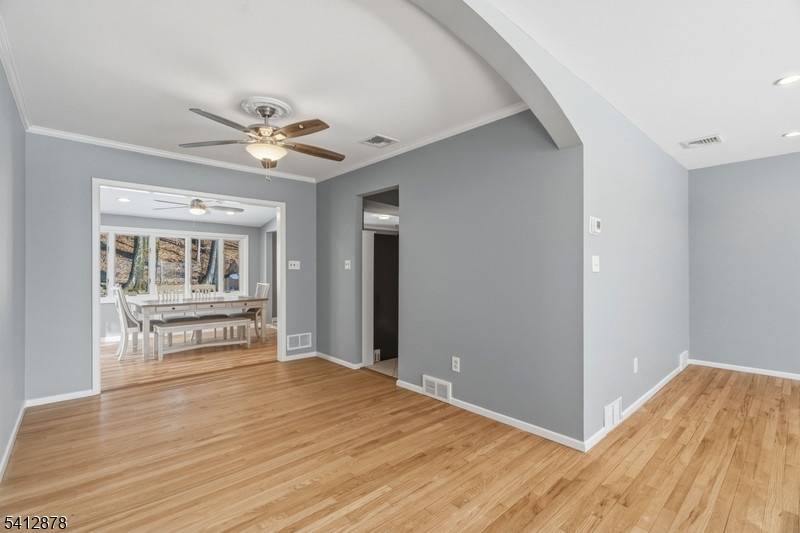 White Meadow Lake community light bright freshly painted raised ranch w 5 brs and 3 full baths.