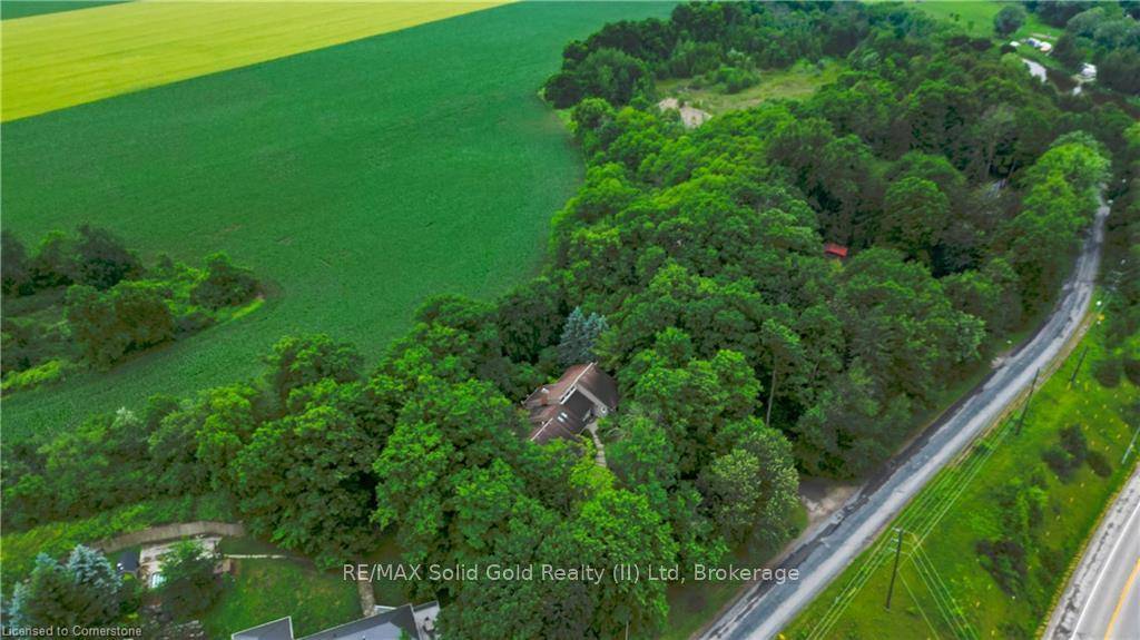Secluded on 0. 75 acres in picturesque West Montrose, this custom built bungalow offers the perfect balance of privacy and convenience, just minutes from the iconic covered bridge.