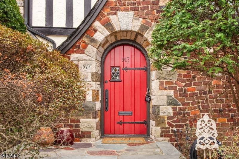 A timeless 1929 residence, meticulously maintained and thoughtfully upgraded to today's standards, offering 5 bedrooms and 3.