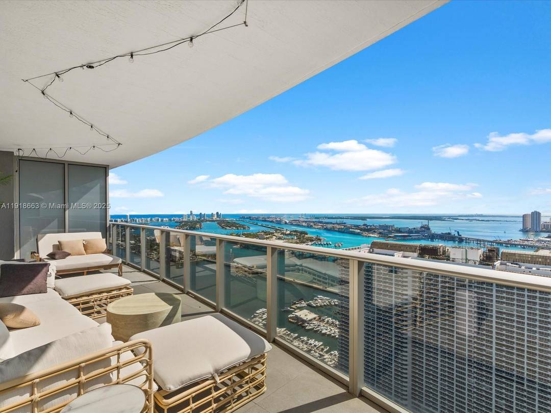Welcome home to this immaculate 3 bedroom 3 bath condo perched high on the 46th floor of the luxurious Aria on the Bay, this stunning residence captures the very essence ...
