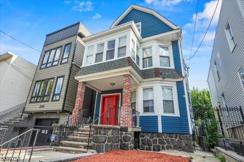 Welcome to this modernized multi family home in Jersey City's West Bergen neighborhood, just steps from Lincoln Park.