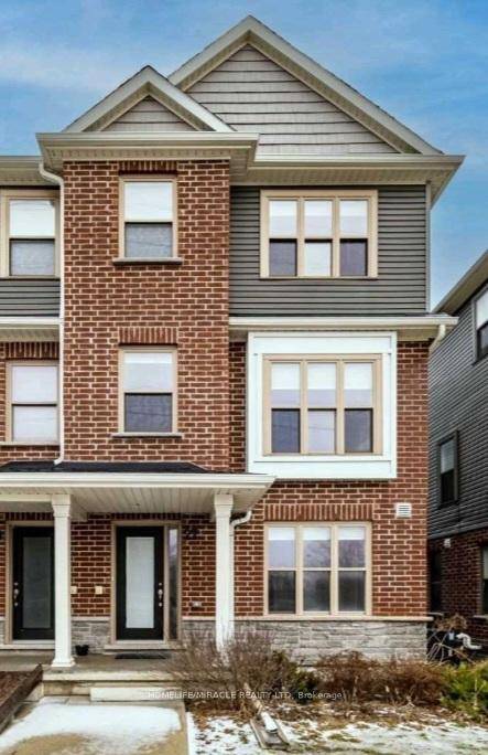 Beautiful amp ; Spacious End Unit Townhome with Rare Double Garage !