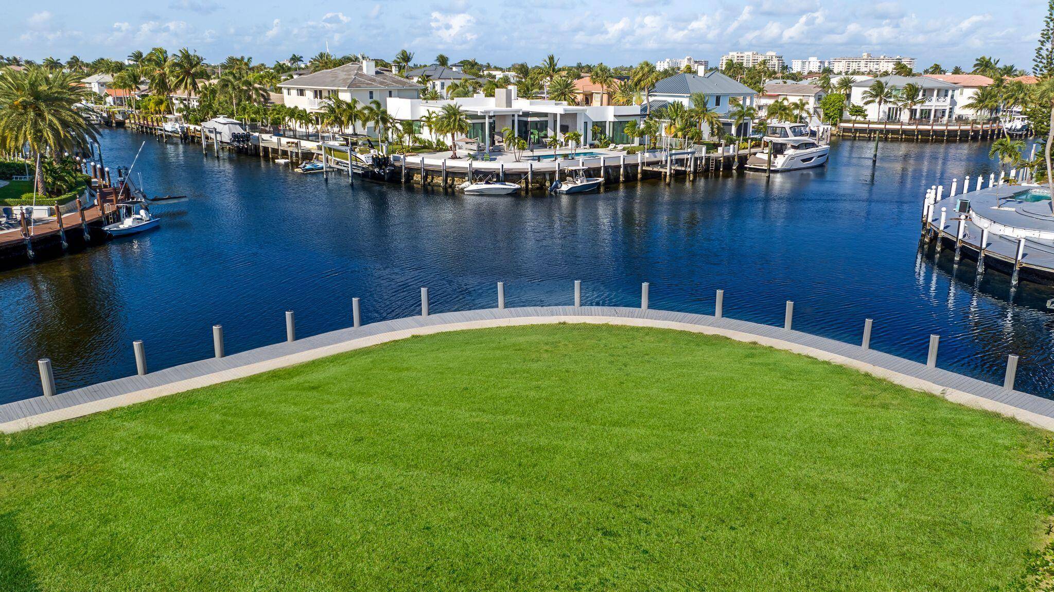 Seize an unparalleled development opportunity in Lighthouse Point with this prime point lot offering 180 degree intracoastal views and easy ocean access.