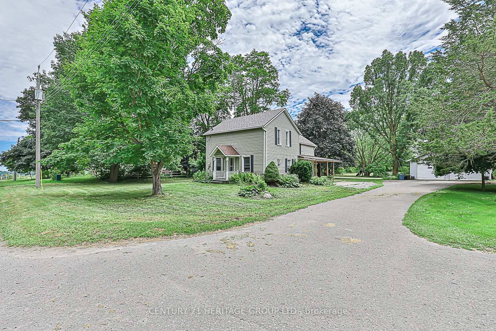 Lovely country home on sprawling almost 1ac lot.