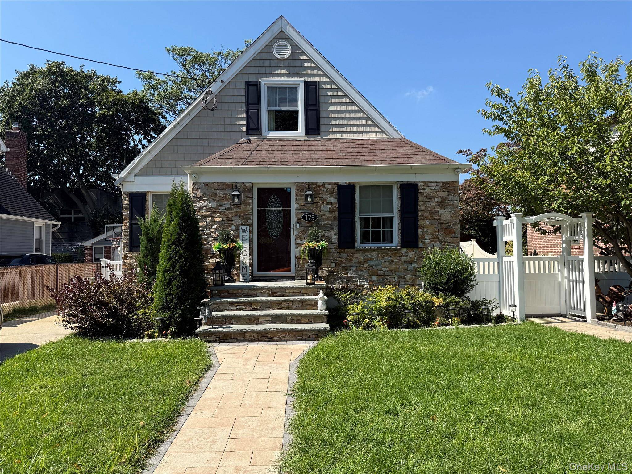A Must See ! Lovely renovated Cape Cod in Mineola school district.