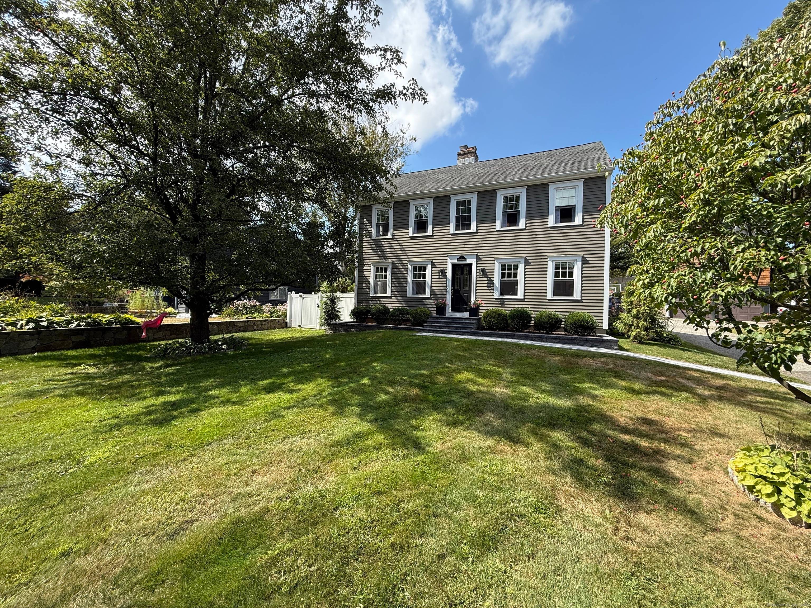 Welcome to 4 Abbott Avenue where charm meets modern living in the heart of Ridgefield !