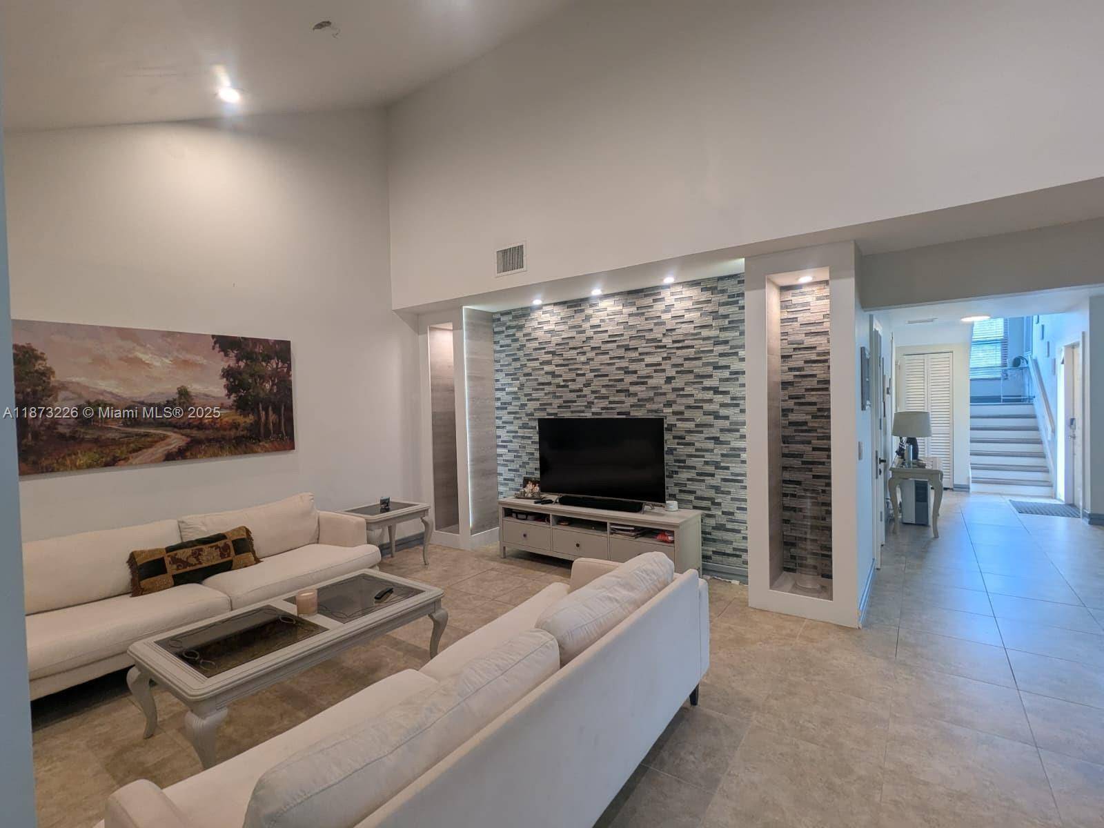 Beautifully remodeled corner townhouse in sought after Boca Raton neighborhood.