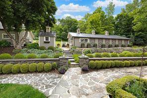 Black Dog Farm, owned by renowned artist, is an exquisite estate that offers a captivating storybook ambiance.