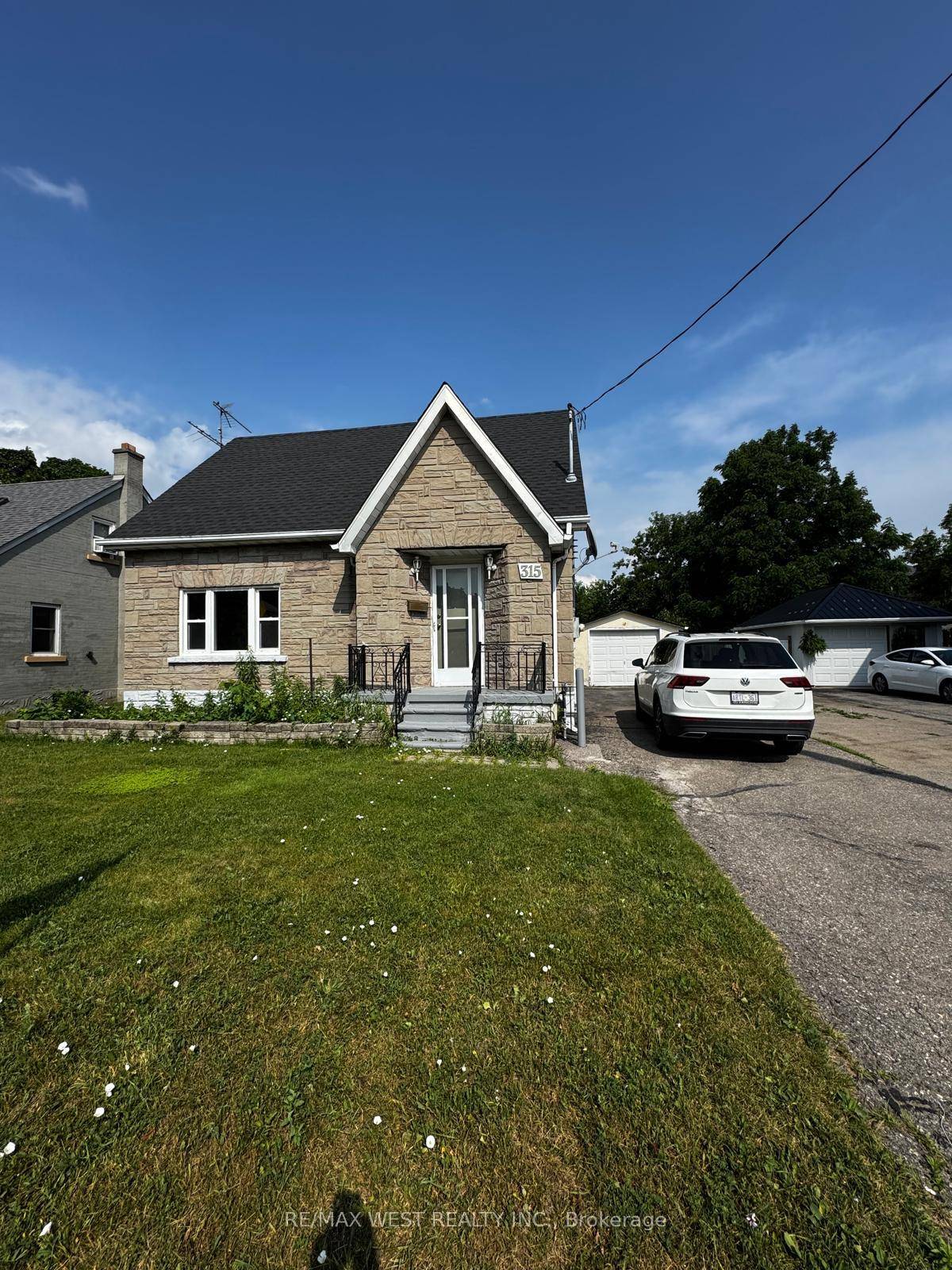 Welcome to 315 Ottawa Street South, a charming and freshly updated 1.