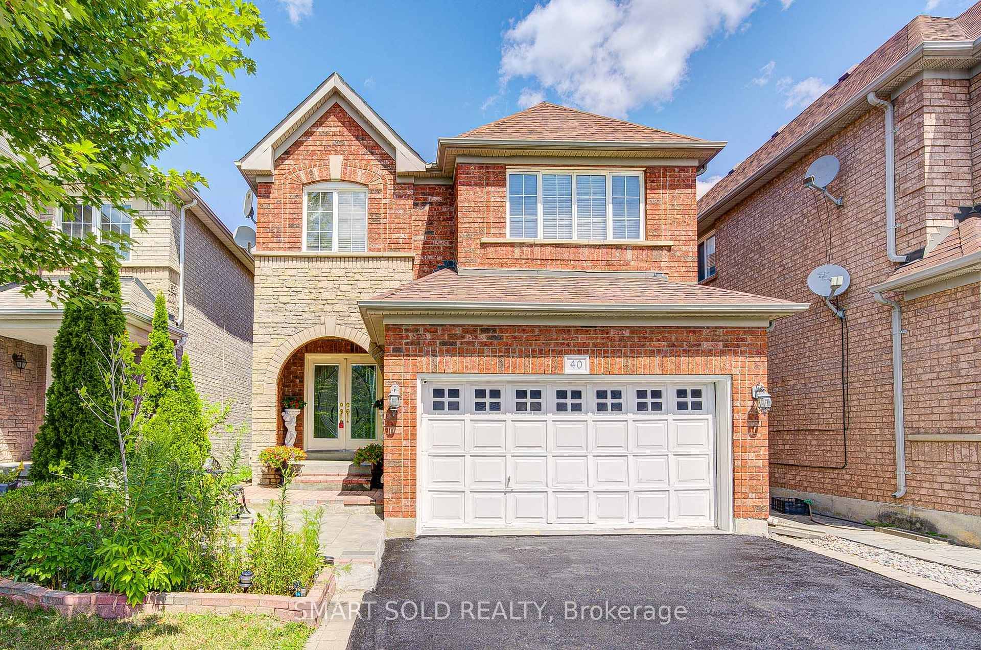 Meticulously Upgraded 2 Car Garage Home Located In The Top Ranking Stephen Lewis Secondary School District, Featuring NO Sidewalk And An Extra Long Private Double Driveway That Accommodates Over 6 ...