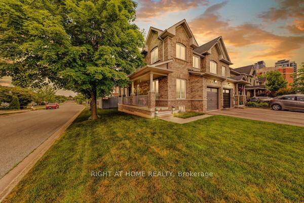 Move in ready corner executive freehold townhome.