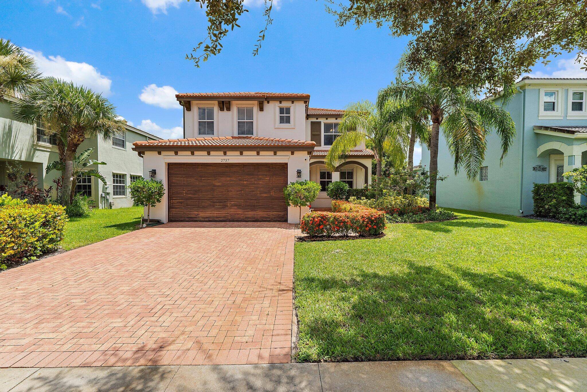 Charming sun filled home in the heart of Royal Palm Beach !