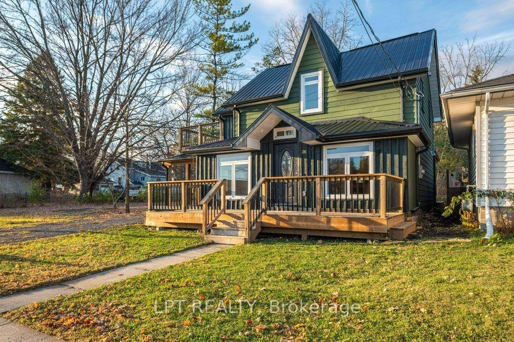 Welcome to a captivating blend of charm and modern luxury at 311 Thomas St.