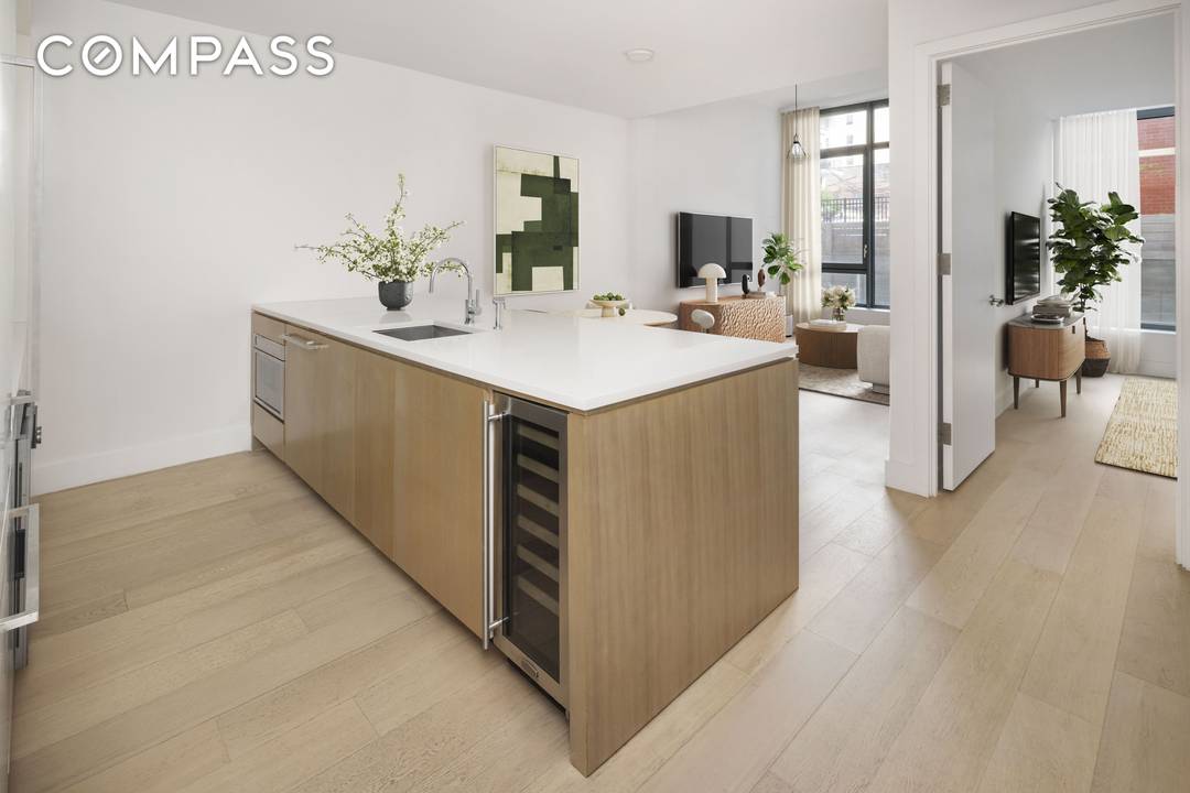 Welcome to 1A at 251 1st Street, a breathtaking Garden unit designed by ODA that blends contemporary design with unparalleled craftsmanship.