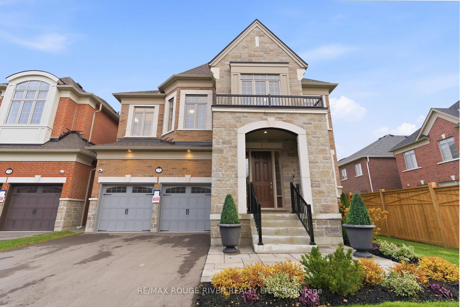Welcome to The Cedarvale B Model by Heathwood Homes, a stunning all brick and stone residence in the desirable Country Lane community.