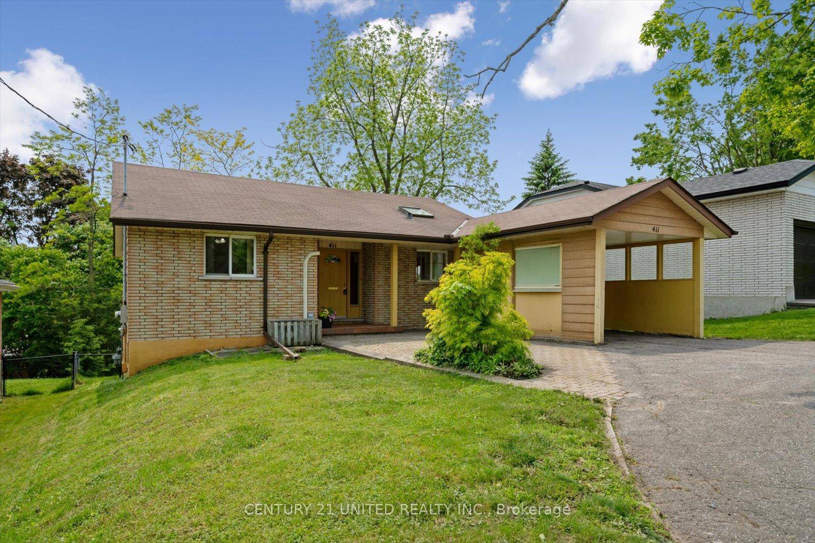 Welcome Home to 411 Highland Road, a bright and versatile brick bungalow in Peterborough's North End.
