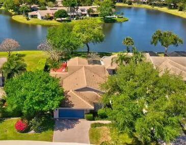Exceptional waterfront residence on an oversized lot with panoramic lake views and space for a private pool.